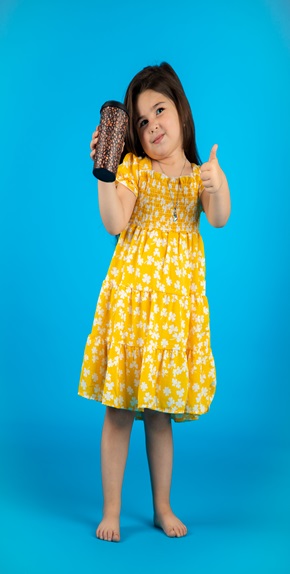 A girl with yellow color dress jug on left hand